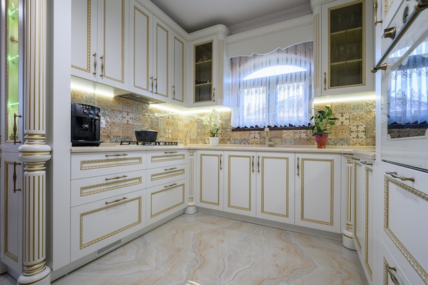 White classic cozy kitchen and dining room in city house