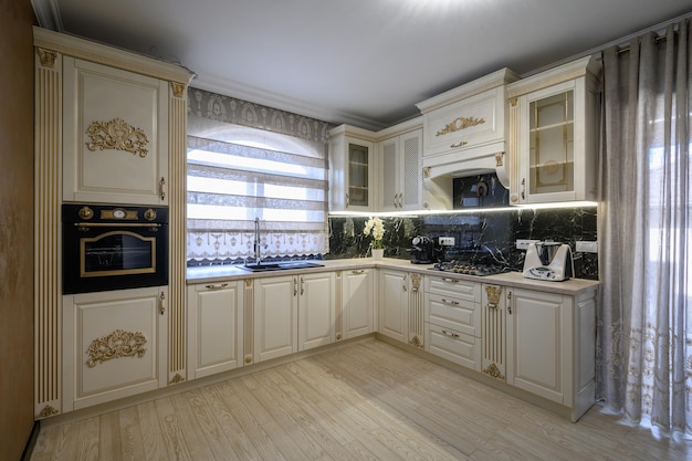 White classic cozy kitchen and dining room in city house