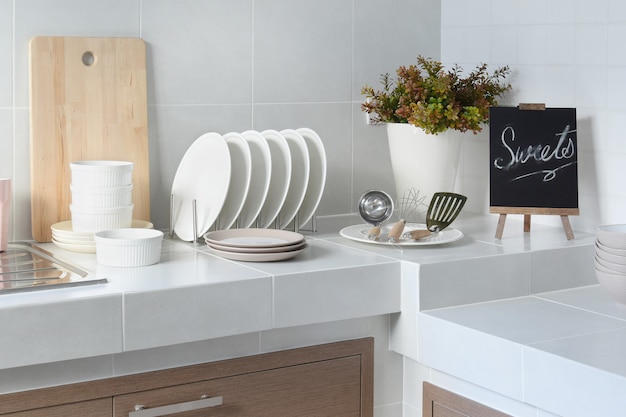 White clean counter in kitchen with utensil at home