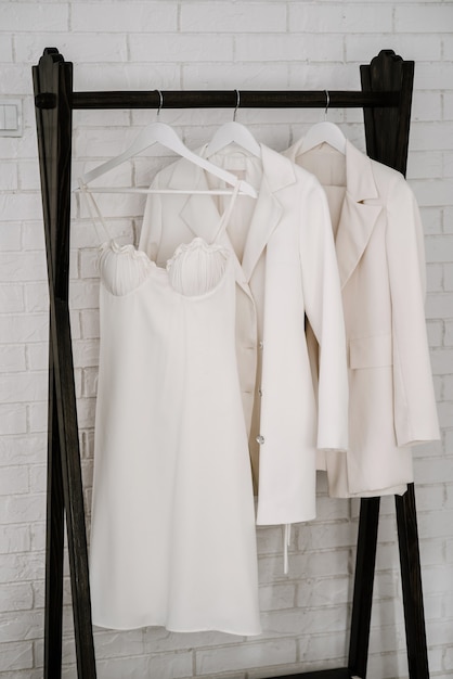 White clothes arranged on hanger holder