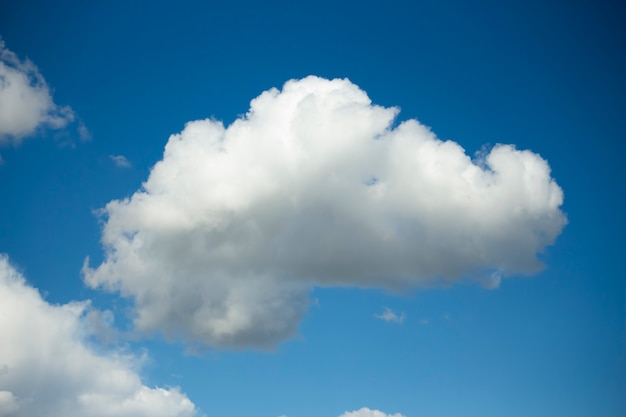 White cloud in the sunlight, in the blue sky.