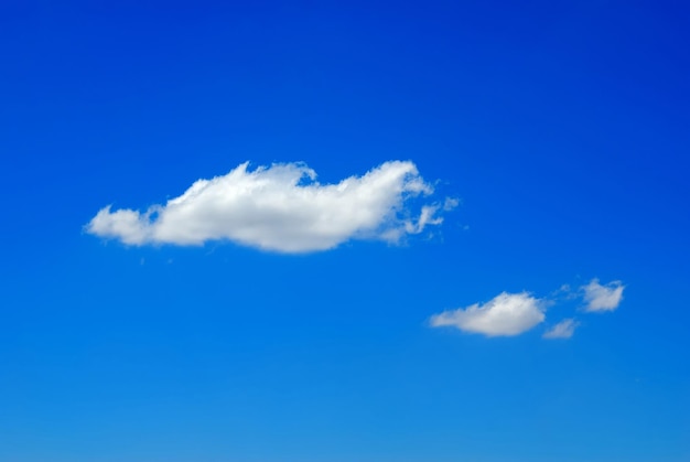 White clouds against the beautiful dark blue sky.