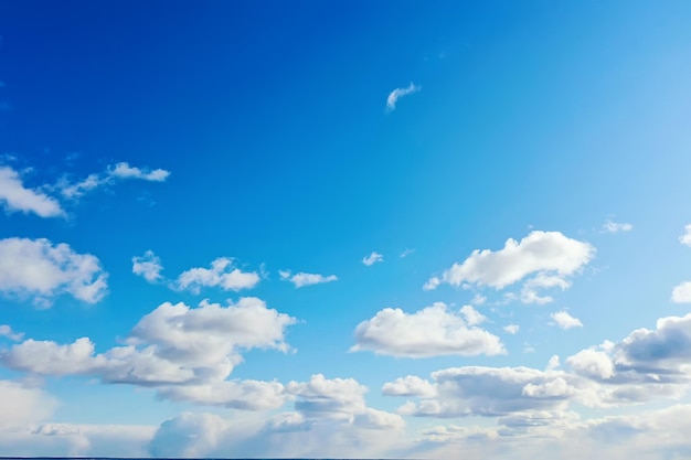 white clouds on blue sky background, abstract seasonal wallpaper, sunny day atmosphere