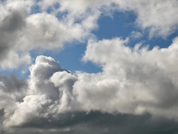 White clouds over blue sky background Fluffy cumulus cloudscape photo