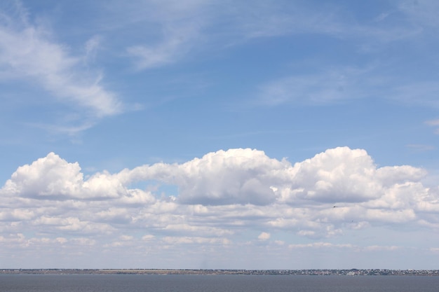 White clouds on the blue sky sky on the city of BelgorodDniester