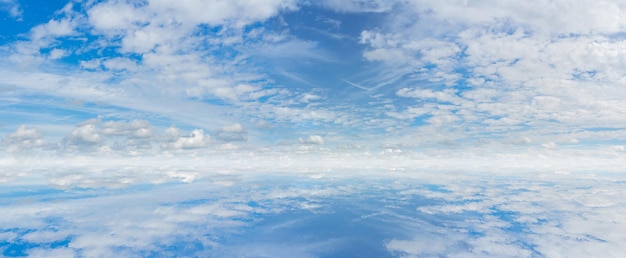 White clouds in the blue sky Summer cloudy weather Light natural background