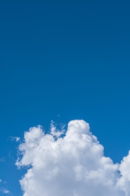 White clouds in the blue sky.