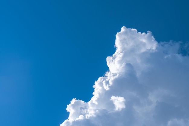 White clouds in the blue sky.