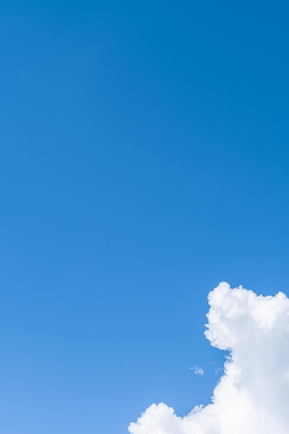 White clouds in the blue sky.