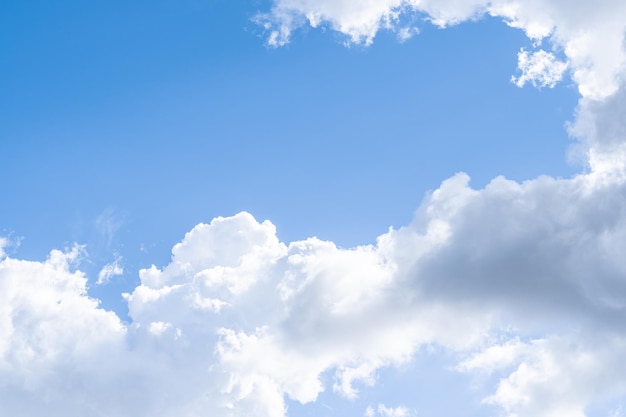 White clouds in the blue sky.