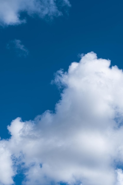 White clouds in the blue sky.