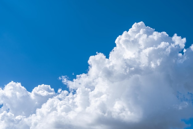 White clouds in the blue sky.