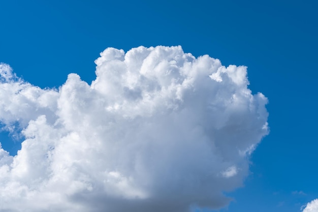 White clouds in the blue sky.