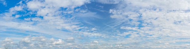 White clouds in the blue sky.