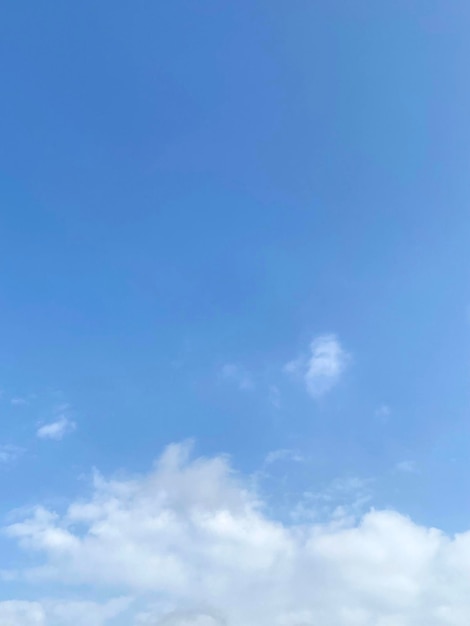 White cloudscape on blue sky background