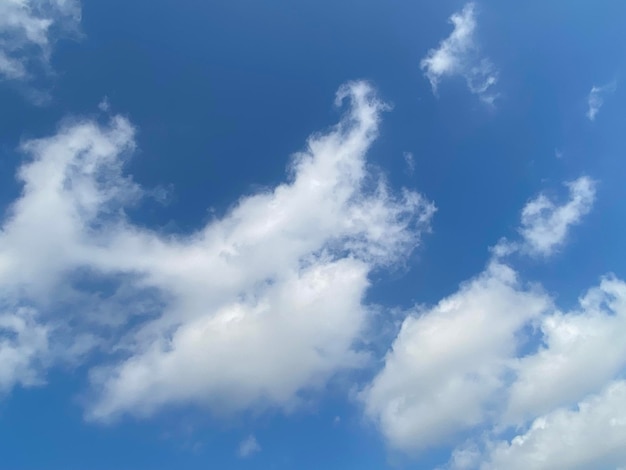 White cloudscape on blue sky background