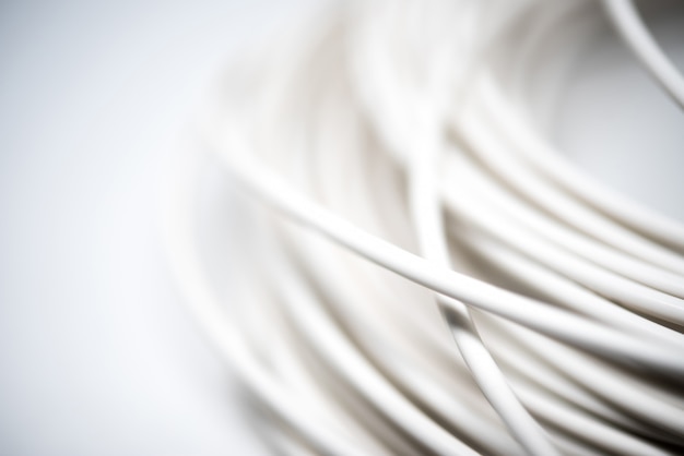 White coaxial cable on a white background