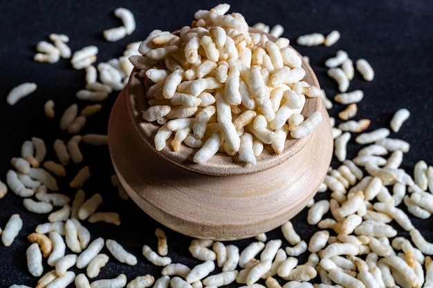 White crispy big puffed rice isolated on black background