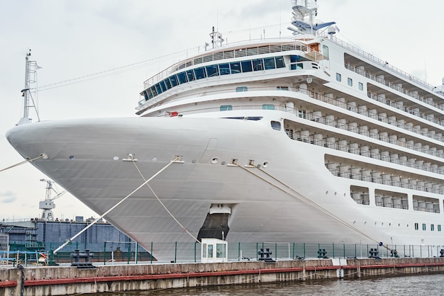 White cruis ship liner docked in the port