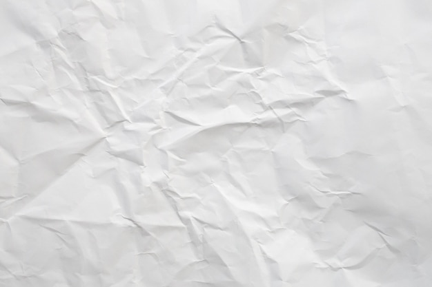 White crumpled and creased paper texture background