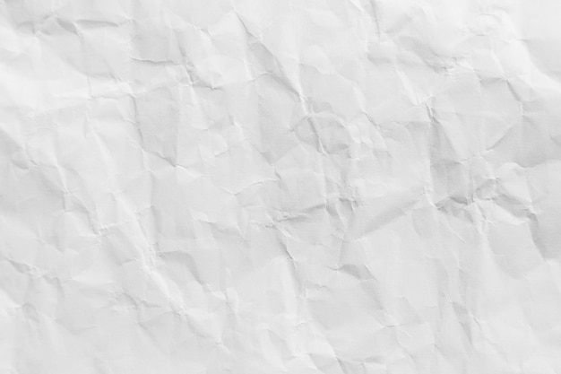 White crumpled recycled paper texture background for design.