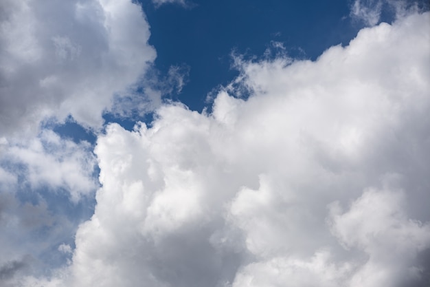 White cumulus clouds on a sunny summer day