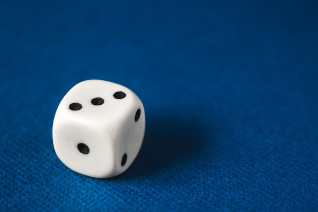 White dice on a blue
 background