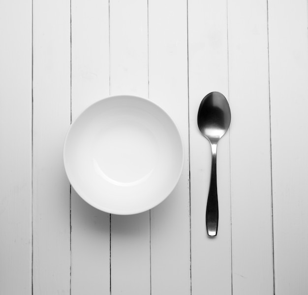 White dish with old spoon