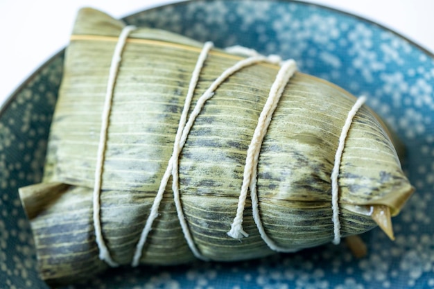 White disk one steaming hot meat dumplings white background on the table