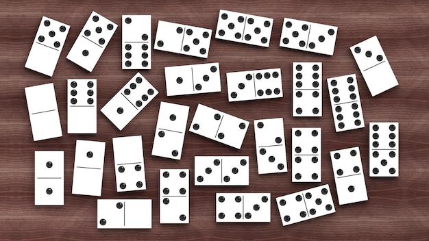 White domino tiles set on wooden background