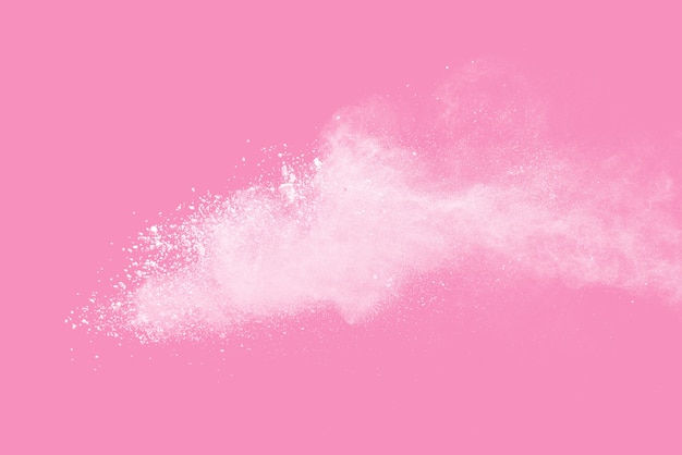 white dust particle splash isolated on pink background