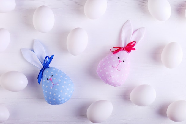 White eggs pattern, including two handmade Easter bunny