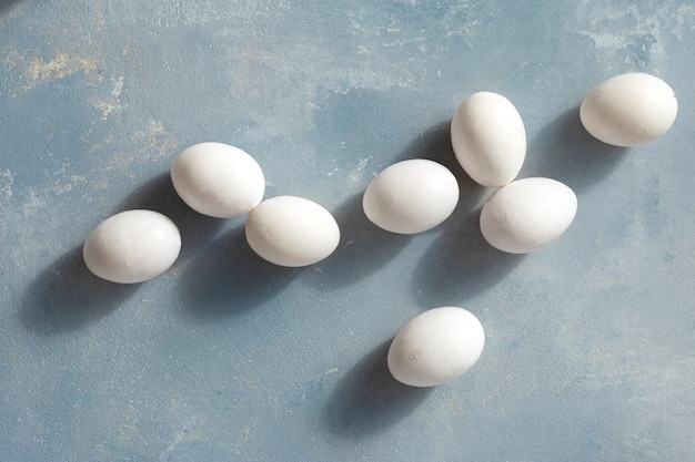 White eggs set on blue background