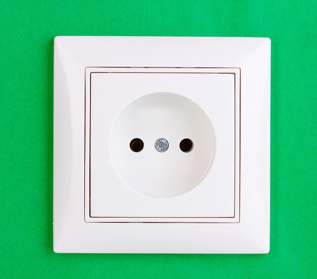 White electric socket on the wall