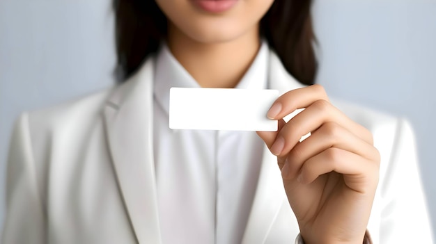 White empty business card held in the hand