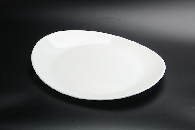 White empty plate for serving isolated