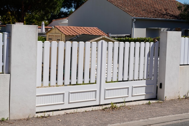 White entry plastic pvc modern style home white gate portal polyvinyl chloride modern gate portal of home door of suburbs house in street view