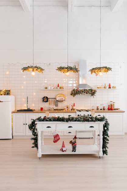 Photo white festive kitchen tiles on the wall white refrigerator red decor elements christmas home design