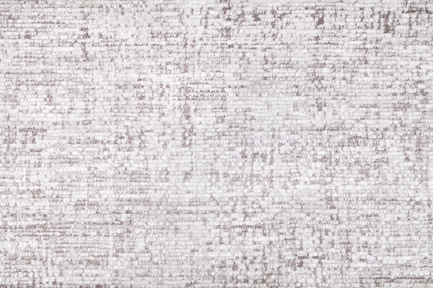 White fluffy background of soft, fleecy cloth. Texture of textile closeup