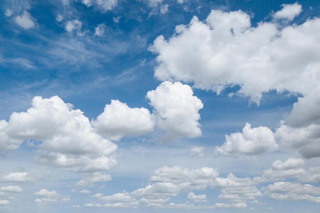 White Fluffy Clouds In Blue Sky Background From Clouds