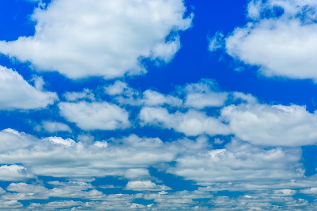 White fluffy clouds in a blue sky