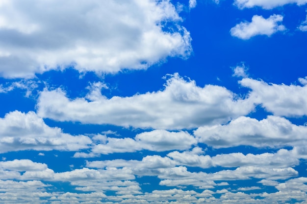 White fluffy clouds in a blue sky