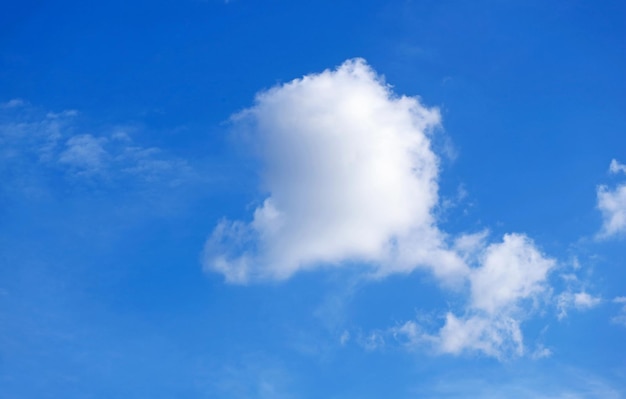 White Fluffy Clouds Floating on Vibrant Blue Sky