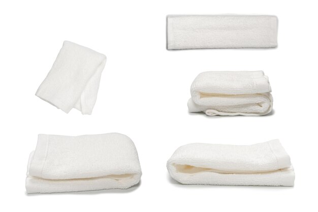 White fluffy cotton towel isolated on a white background Spa and resort