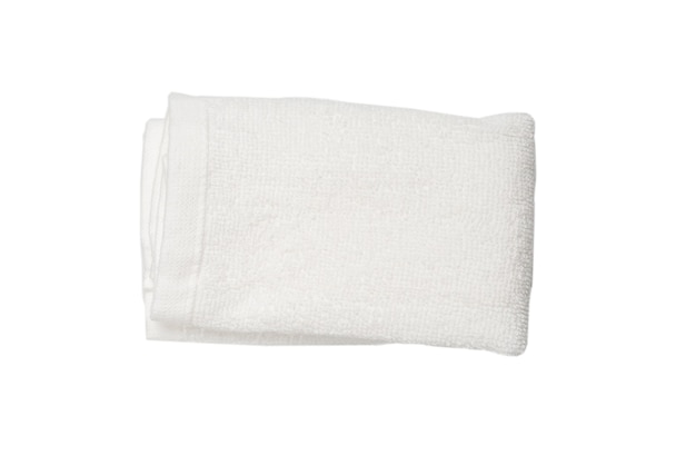 White fluffy cotton towel isolated on a white background. Spa and resort.