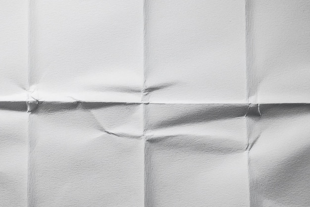 Photo white folded paper texture white paper with deep folds textured white folded surface white folded