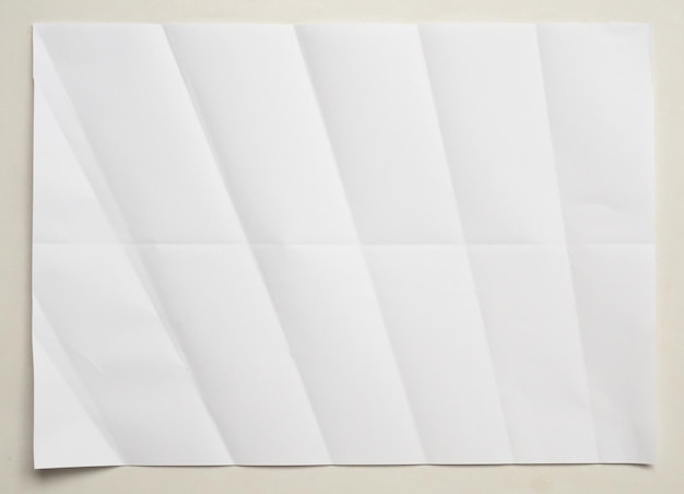 White folded and wrinkled paper on white background