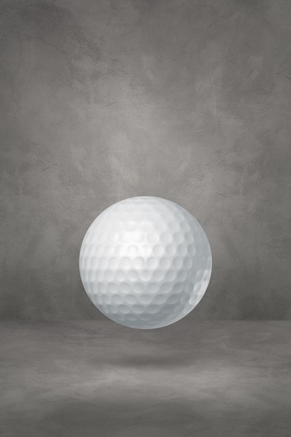 White golf ball isolated on a concrete studio background. 3D illustration