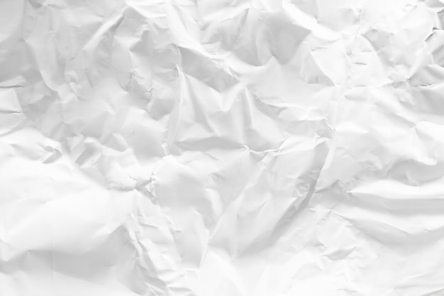 White and gray crumpled paper texture background crush paper so that it becomes creased and wrinkled