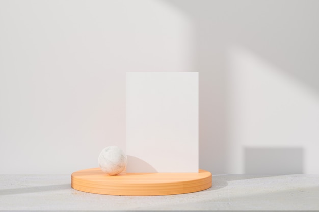 white greeting card standing on table background